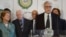 Syria peace envoy Lakhdar Brahimi, behind podium at Arab League headquaraters in Cairo Oct. 24, 2012. Seen in the background from left are former president of Ireland Mary Robinson (R) and former US president Jimmy Carter (2nd L)