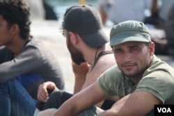 The boat leaving for Athens from Lesvos on Saturday was sold out for the weekend, as everyone arriving from Turkey who can afford it leaves as soon as possible for the next country toward Germany, Sept. 12, 2015. (Credit: Heather Murdock/VOA)