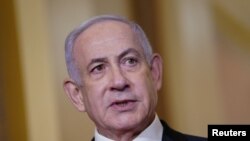 FILE PHOTO: Israeli Prime Minister Netanyahu meets with U.S. House Speaker Johnson at Capitol in Washington