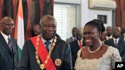 Lauren Gbagbo, l'ancien président ivoirienne et son épouse Simone.