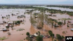 FILE - This video grab taken from handout aerial video footage by UNICEF Jan. 24, 2021, shows widespread flooding in the Buzi area of Mozambique after the landfall of Cyclone Eloise. (AFP PHOTO/UNICEF/Bruno Pedro)
