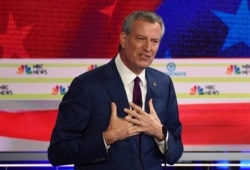 Democratic presidential hopeful Mayor of New York City Bill de Blasio participates in the first Democratic primary debate of the 2020 presidential campaign at the Adrienne Arsht Center for the Performing Arts in Miami, June 26, 2019.