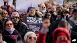 Protesters gather for an anti-vaccine rally in front of the Lincoln Memorial in Washington, Jan. 23, 2022. 