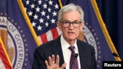 FILE PHOTO: Fed Chair Powell speaks at a press conference in Washington