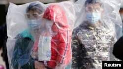 A closed entrance of a residential community is seen in Shanghai, China, as the country continues to fight the outbreak of a new coronavirus, Feb. 8, 2020.