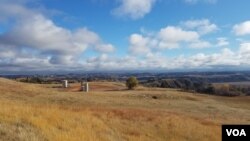 Oil equipment sits atop a well in western North Dakota. This region of the state features the Bakken formation - one of the largest oil deposits in the country. (Matt Haines/VOA)