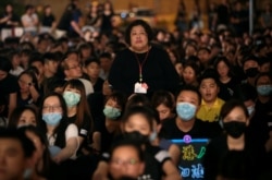 Members of Hong Kong's medical sector attend a rally to support the anti-extradition bill protest in Hong Kong, Aug. 2, 2019.