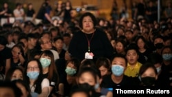 Members of Hong Kong's medical sector attend a rally to support the anti-extradition bill protest in Hong Kong, Aug. 2, 2019. 