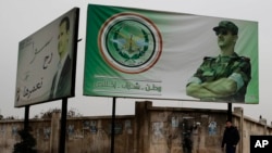 叙利亚阿勒颇街头领导人阿萨德的广告牌(资料照)