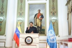 FILE - Venezuela's President Nicolas Maduro speaks virtually during the 75th annual U.N. General Assembly, from Miraflores Palace in Caracas, Venezuela, Sept. 23, 2020.