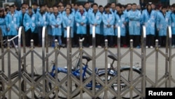 Aksi mogok pekerja pabrik IBM di Shenzhen, province Guangdong, China.