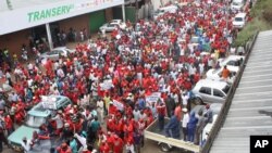 Opposition protesters march demanding the resignation of President Robert Mugabe in Harare, Zimbabwe, March, 14, 2016. Mugabe, 92, is one of Africa’s longest-serving leaders. He recently announced he will run for re-election in 2018.