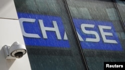 A camera is seen on the exterior of a Chase Bank branch in New York City U.S., April 7, 2021. REUTERS/Brendan McDermid/File Photo
