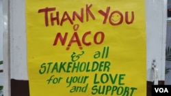 HIV activists, who demanded a regular supply of ART drugs for all HIV patients in India, left this poster on the wall in front of the NACO office, in New Delhi, Sept. 1, 2022. (Jitendra Jha/VOA)