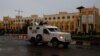 FILE - A UN vehicle patrols the streets before the polls open for the presidential election in Bamako, Mali, July, 29 2018.