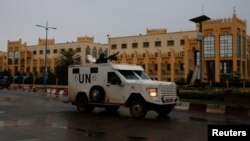 FILE - A U.N. vehicle patrols the streets in Bamako, Mali, July, 29 2018. 