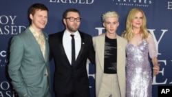 FILE - From left, Lucas Hedges, Joel Edgerton, Troye Sivan and Nicole Kidman arrive at the Los Angeles premiere of "Boy Erased," Oct. 29, 2018, at the Directors Guild of America. The movie has given momentum to the drive to ban gay conversion therapy for minors.