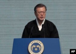 South Korean President Moon Jae-in delivers a speech during a ceremony to mark the 100th anniversary of the March First Independence Movement Day, the anniversary of the 1919 uprising against Japanese colonial rule, in Seoul, South Korea, March 1, 2019.