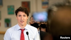 FILE - Canada's Prime Minister Justin Trudeau talks during a news conference at the daycare inside Carrefour de l'Isle-Saint-Jean school in Charlottetown, Prince Edward Island, Canada, July 27, 2021. 
