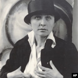 American artist Georgia O'Keeffe, seen here in a portrait from 1918, is best known for her paintings of flowers and landscapes, but she was also a gifted abstract artist.