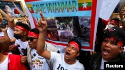 Protesters shout slogans during a demonstration to mark the second anniversary of Myanmar's 2021 military coup, outside the Embassy of Myanmar in Bangkok, Thailand, Feb. 1, 2023. 