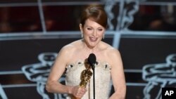 Julianne Moore accepts the award for best actress in a leading role for “Still Alice at the Oscars on Sunday, Feb. 22, 2015, at the Dolby Theatre in Los Angeles. (Photo by John Shearer/Invision/AP)
