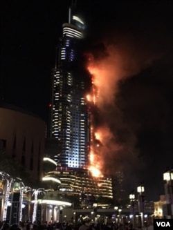 The luxury Address Downtown Dubai hotel, a favorite with international celebrities and wealthy travelers, had been packed with people who came to see the fireworks. Authorities said they were able to evacuate everyone safely. (M. Besheer/VOA)