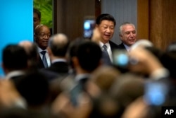 在厦门金砖峰会期间，中国主席习近平和南非总统祖马（左）、巴西总统特梅尔抵达会场，参加金砖国家工商论坛开幕式（2017年9月3日）