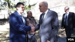 არჩილ ტატუნაშვილის წამებასა და მკვლელობაში ბრალდებული დავით გურწიევი (მარცხნივ) და დე-ფაქტო ცხინვალის ყოფილი პრეზიდენტი ლეონიდ თიბილოვი (მარჯვნივ)