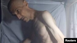 FILE - Imprisoned Iranian activist Farhad Meysami, who is reported to have gone on a hunger strike, is seen at Rajai Shahr prison in Karaj, Iran, in this social media image released Feb. 2, 2023. 