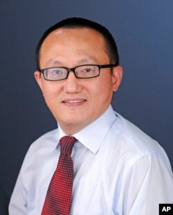 FILE - This undated file photo provided by the University of Kansas shows researcher Feng “Franklin” Tao.