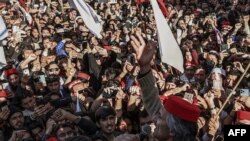 Activists of Awami National Party (ANP) gather during a peace rally following a mosque suicide blast inside police headquarters, in Peshawar, Pakistan, on Feb. 4, 2023.
