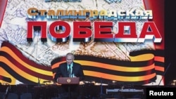 Russian President Vladimir Putin speaks during a concert marking the 80th anniversary of the Battle of Stalingrad in the World War II, in Volgograd, Russia, Feb. 2, 2023. (Sputnik/Dmitry Azarov/Pool via Reuters)