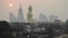 The giant Buddha statue of Wat Paknam Phasi Charoen temple is seen amid air pollution in Bangkok, Thailand, February 2, 2023.