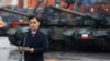 FILE - South Korea's Defense Acquisition Program Administration Minister Eom Dong-hwan attends a press conference in Gdynia, Poland, Dec. 6, 2022, as Poland welcomes the first delivery of tanks and howitzers from South Korea.