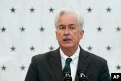 FILE - CIA Director William Burns speaks at CIA headquarters in Langley, Virginia, July 8, 2022.