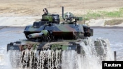 FILE - A Leopard 2 tank is seen in Munster, May 20, 2019. 