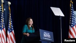 FILE - Sarah Huckabee Sanders, former White House Press Secretary, delivers remarks at the America First Policy Institute America First Agenda Summit in Washington, July 26, 2022.