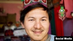 French-Afghan photojournalist Mortaza Behboudi is seen in an undated photo circulating on social media.