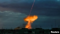 An explosion follows the downing of a Russian drone in Kherson, Ukraine, on July 26, 2024.