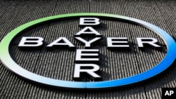 FILE - Germany-based Bayer AG has a deal to acquire U.S.-based Monsanto Co. A U.S. Senate panel on Tuesday is scrutinizing the proposed merger. 