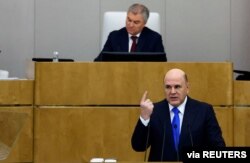 미하일 미슈스틴(오른쪽) 러시아 총리가 국가두마(하원)에서 연설하고 있다. (자료사진)