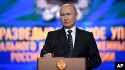 President Vladimir Putin speaks at a meeting with officers of Russia's military intelligence, GRU, in Moscow, Nov. 2, 2018 . 