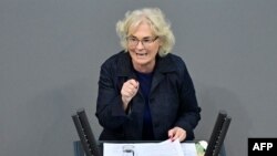 German Defense Minister Christine Lambrecht addresses members of the parliament during a session of the Bundestag (lower house of parliament) in Berlin, April 6, 2022.