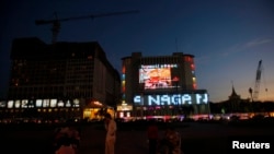 A general view of people in front of NagaWorld casino in central Phnom Penh January 11, 2014.