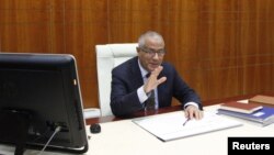 Libya's Prime Minister Ali Zeidan speaks during an interview with Reuters in Tripoli, March 10, 2014.