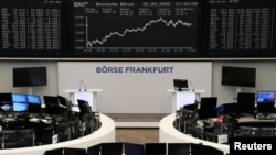FILE -The DAX share graph is pictured at the stock exchange in Frankfurt, Germany, May 22, 2020.