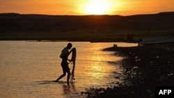 The wind farm is to be established near Lake Turkana, the biggest desert lake in the world and the scene of extremely strong and regular winds [photo: AFP]