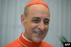 Newly elevated cardinal, Argentinian prelate Victor Manuel Fernandez, attends a visit of relatives on Sept. 30, 2023.