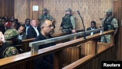 Mozambique's former finance minister Manuel Chang appears in court during an extradition hearing in Johannesburg, South Africa, Jan. 8, 2019. 